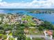 Aerial photo of neighborhood with water views highlighting neighborhood with water access and green space at 5704 Bay Side Dr, Orlando, FL 32819