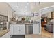 Bright kitchen featuring modern appliances, tile backsplash, and open floor plan, ideal for cooking and entertaining at 5704 Bay Side Dr, Orlando, FL 32819