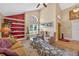 Bright and airy living room with high ceilings and comfortable seating arrangement at 5704 Bay Side Dr, Orlando, FL 32819