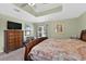 Bedroom with large bed, and bureau at 5704 Bay Side Dr, Orlando, FL 32819