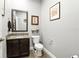 Cozy bathroom with a granite countertop vanity and neutral wall color at 6346 Dallas Blvd, Orlando, FL 32833