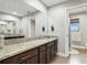 Bright bathroom with a double vanity and a large mirror at 6346 Dallas Blvd, Orlando, FL 32833