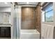 Bathroom with a shower and tub combination at 6346 Dallas Blvd, Orlando, FL 32833