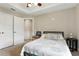Comfortable bedroom with a ceiling fan and neutral decor at 6346 Dallas Blvd, Orlando, FL 32833