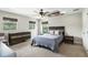 Relaxing bedroom featuring ample natural light and modern furnishings at 6346 Dallas Blvd, Orlando, FL 32833