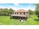 Aerial view of a spacious home with a large, screened-in patio and backyard, perfect for entertaining guests at 6346 Dallas Blvd, Orlando, FL 32833