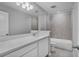 Bright bathroom featuring white cabinets, quartz countertop, and a shower/tub combination at 840 Livestock Loop, St Cloud, FL 34771