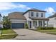 Charming two-story home with a well-manicured lawn and a two-car garage, perfect for modern Gathering living at 840 Livestock Loop, St Cloud, FL 34771