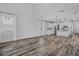 Open living area featuring ample natural light and seamless connection to modern kitchen at 840 Livestock Loop, St Cloud, FL 34771