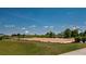 Outdoor basketball court and picnic tables in the community at 9814 Amber Chestnut Way, Winter Garden, FL 34787