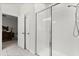 Bathroom shower featuring a glass door and white tile at 9814 Amber Chestnut Way, Winter Garden, FL 34787
