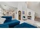 Open floor plan with views of the modern kitchen and living room featuring a grandfather clock at 9814 Amber Chestnut Way, Winter Garden, FL 34787