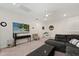 Bright living room features an entertainment area and comfortable seating at 9814 Amber Chestnut Way, Winter Garden, FL 34787