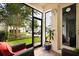 Inviting screened patio with comfortable seating and views of the landscaped surroundings at 9814 Amber Chestnut Way, Winter Garden, FL 34787