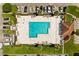 Aerial view of the community pool and surrounding amenities at 999 Mancha Real Dr, Orlando, FL 32807
