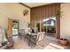 Relaxing screened patio with tile flooring and an outdoor seating area at 999 Mancha Real Dr, Orlando, FL 32807