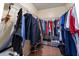 Walk-in closet featuring wire shelving and tile floors at 999 Mancha Real Dr, Orlando, FL 32807