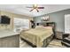 Comfortable bedroom with natural light and carpet flooring at 1019 Lake Berkley Dr, Kissimmee, FL 34746