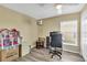 Versatile bedroom with ample natural light, suitable for a home office or playroom at 1019 Lake Berkley Dr, Kissimmee, FL 34746