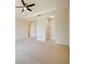 Spacious bedroom with neutral colored walls and walk-in closet at 10653 Belfry Cir, Orlando, FL 32832