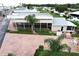 Charming backyard with a screened lanai and meticulously maintained garden at 1115 Deer Creek Blvd, Davenport, FL 33837