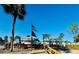 Outdoor gathering area with an American flag, tables, and umbrellas at 1115 Deer Creek Blvd, Davenport, FL 33837