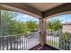 Balcony view showcases a park, green landscape, and neighborhood scenery at 11837 Cave Run Ave, Windermere, FL 34786