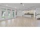 Bright living space with tile flooring and French doors leading to the backyard at 11837 Cave Run Ave, Windermere, FL 34786
