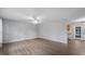 Spacious living room area with new flooring and modern lighting at 1209 Russell Dr, Ocoee, FL 34761