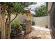 Landscaped backyard featuring a well-maintained air conditioning unit at 12884 Calderdale Ave, Windermere, FL 34786