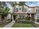 Charming two-story home with a landscaped front yard and inviting entrance, perfect for a Gathering at 12884 Calderdale Ave, Windermere, FL 34786