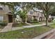 Beautiful townhomes with landscaped yards and inviting entrances offer curb appeal at 12884 Calderdale Ave, Windermere, FL 34786