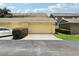 Street view of well-maintained garages attached to homes in a neat neighborhood at 12884 Calderdale Ave, Windermere, FL 34786