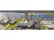 Aerial view of community with waterfront access, clubhouse, pool, boat slips, and parking at 1401 W Highway 50 # 152, Clermont, FL 34711