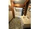 This bathroom features an old vanity, toilet, tub, shower, and wood accents at 1425 26Th St, Orlando, FL 32805