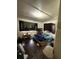 This bedroom features a window, dark curtains and wood floors at 1425 26Th St, Orlando, FL 32805