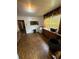 Kitchen featuring cabinets, window, and outdated microwave at 1425 26Th St, Orlando, FL 32805