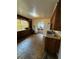 View of kitchen with old cabinets and flooring at 1425 26Th St, Orlando, FL 32805