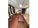Living room with old carpet, fireplace and bookshelf at 1425 26Th St, Orlando, FL 32805