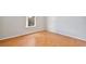 Bedroom with natural light, wood floors, and neutral wall color at 14332 Grassy Cove Cir, Orlando, FL 32824