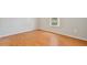Bedroom with laminate floors and a window that allows natural light at 14332 Grassy Cove Cir, Orlando, FL 32824