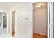 Hallway with access to bathroom shower, and walk-in closet at 14332 Grassy Cove Cir, Orlando, FL 32824