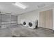 Garage featuring laundry hookups, an overhead door, and storage space at 14402 Sw 34Th Terrace Rd, Ocala, FL 34473