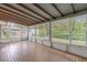 Enclosed sunroom showcasing tile flooring and several windows that provide plenty of natural light at 14402 Sw 34Th Terrace Rd, Ocala, FL 34473