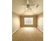 This spacious bedroom features a ceiling fan and a window providing natural light at 15258 Windmill Harbor Ct, Orlando, FL 32828