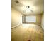 Comfortable bedroom featuring neutral walls, carpet, a ceiling fan, and a window providing natural light at 15258 Windmill Harbor Ct, Orlando, FL 32828