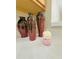 Close-up of decorative vases and a scented candle on a stylish countertop at 15258 Windmill Harbor Ct, Orlando, FL 32828