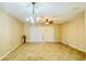 Bright dining area with stylish chandelier, ceiling fan and sliding glass doors for ample natural light at 15258 Windmill Harbor Ct, Orlando, FL 32828