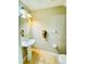 Neat half bathroom featuring pedestal sink, neutral walls and tile floors for a cozy space at 15258 Windmill Harbor Ct, Orlando, FL 32828