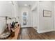 Beautiful entryway with wood-look tile, a glass door and natural light at 15716 Sweet Lemon Way, Winter Garden, FL 34787